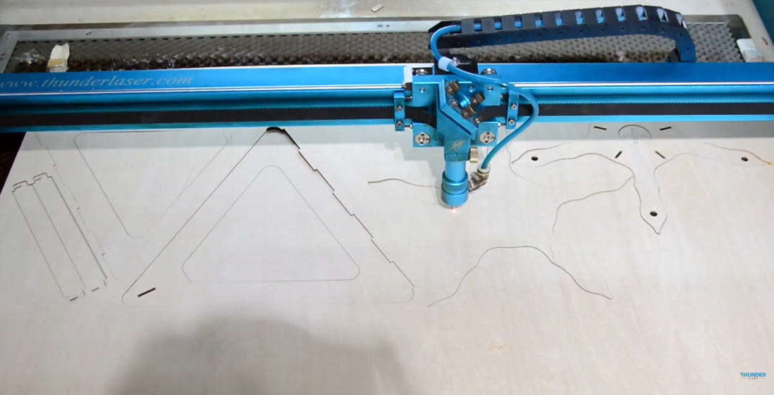 laser cutting rotating photo frame plywood parts.png