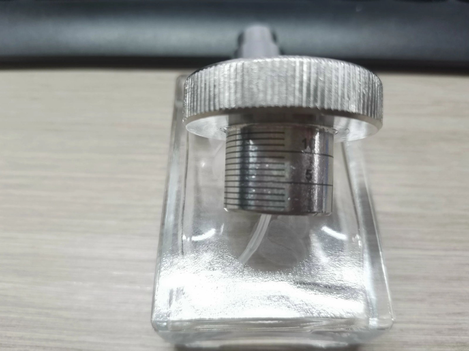 Industrial component processing with rotary attachment Industrial component processing with rotary attachment